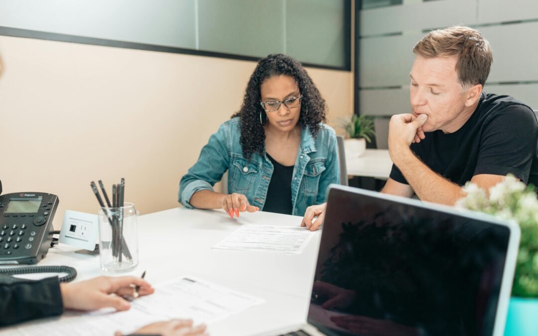 Clients meeting with an estate planning lawyer.